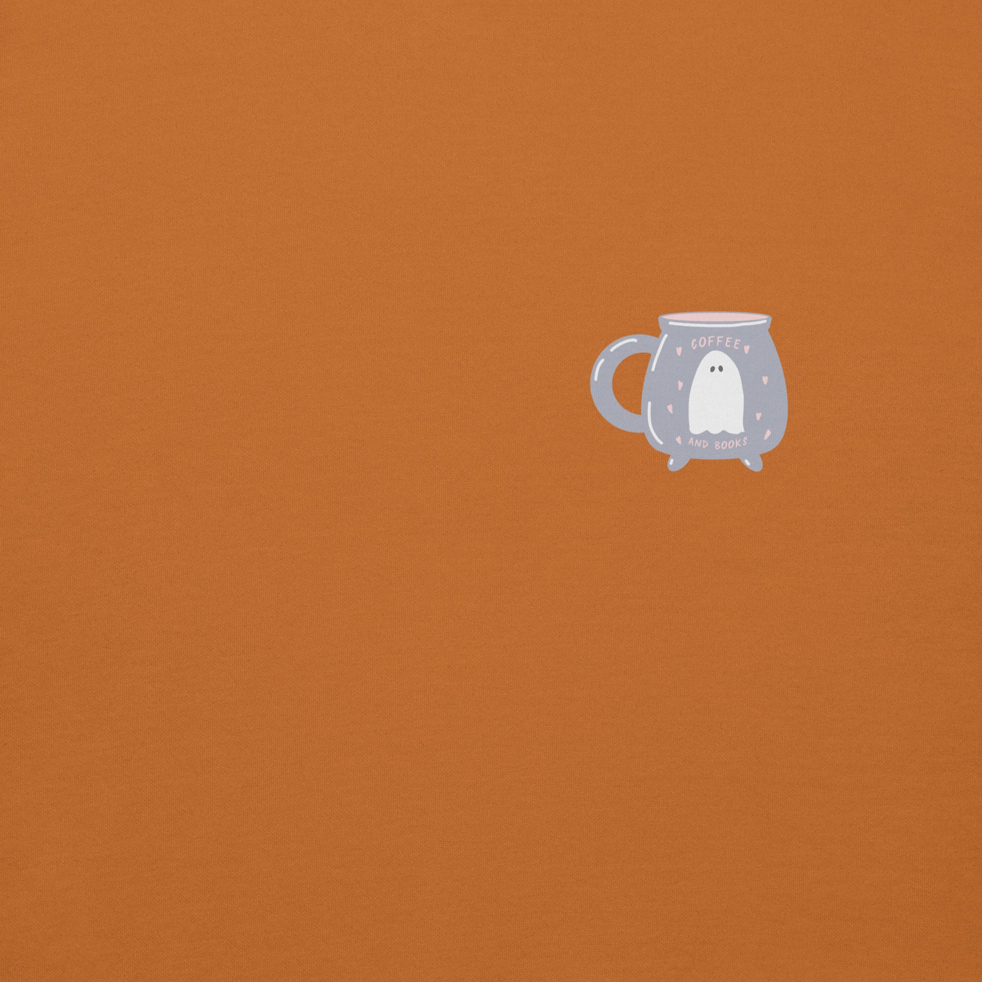 Ghost inside of a Cauldron shaped Mug design on a burnt orange background.