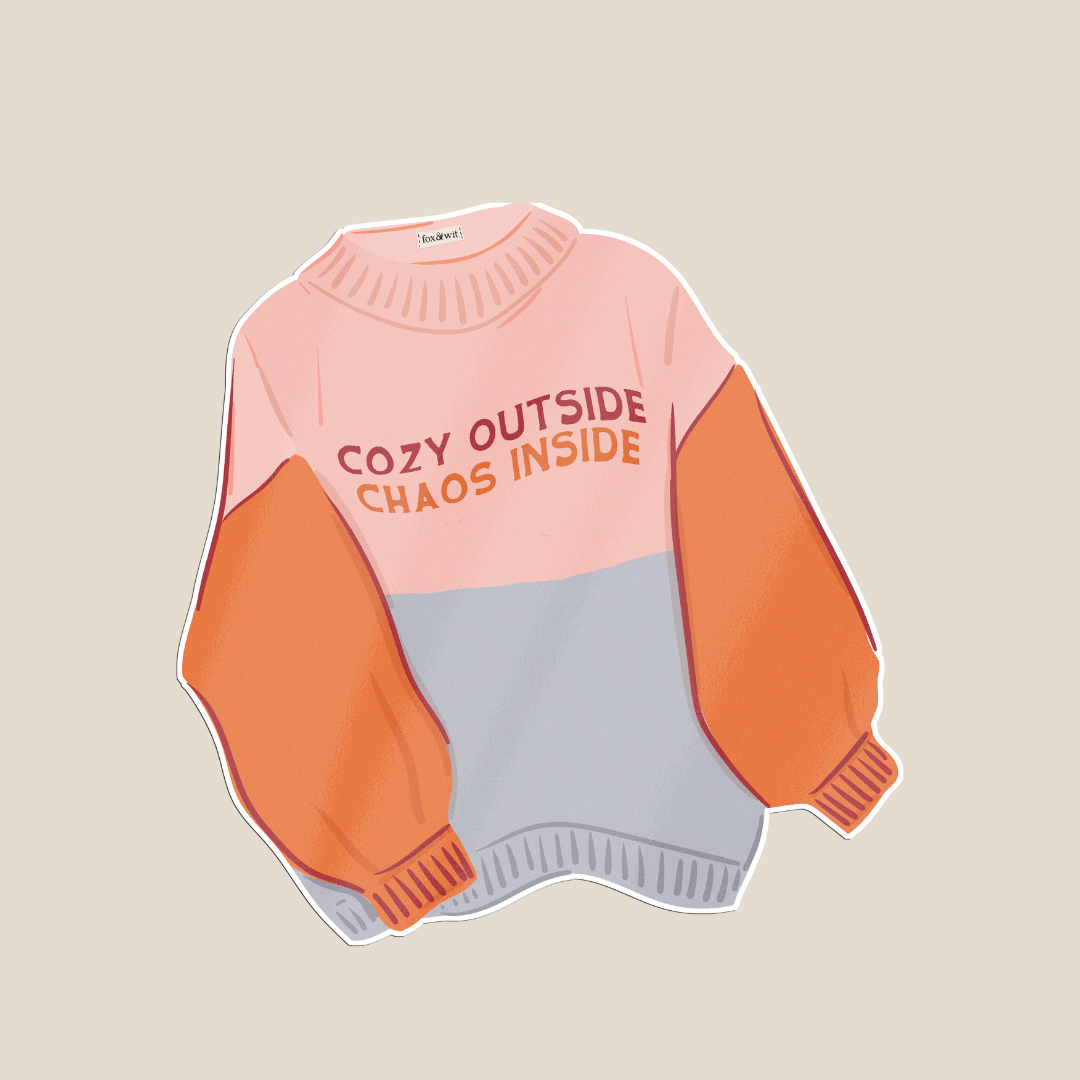 Cozy Outside, Chaos Inside sticker! Featuring illustrated sweater with warm tones of peach, orange, and soft gray